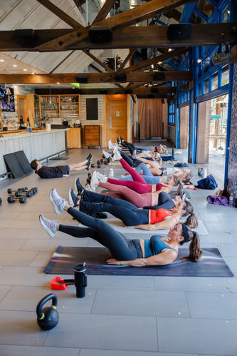 Clients working through core training at a Telos Charleston event